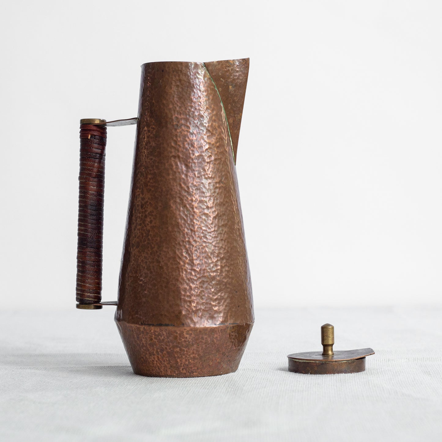 Unique Arts and Crafts copper lidded pitcher, England. Early 20th Century.