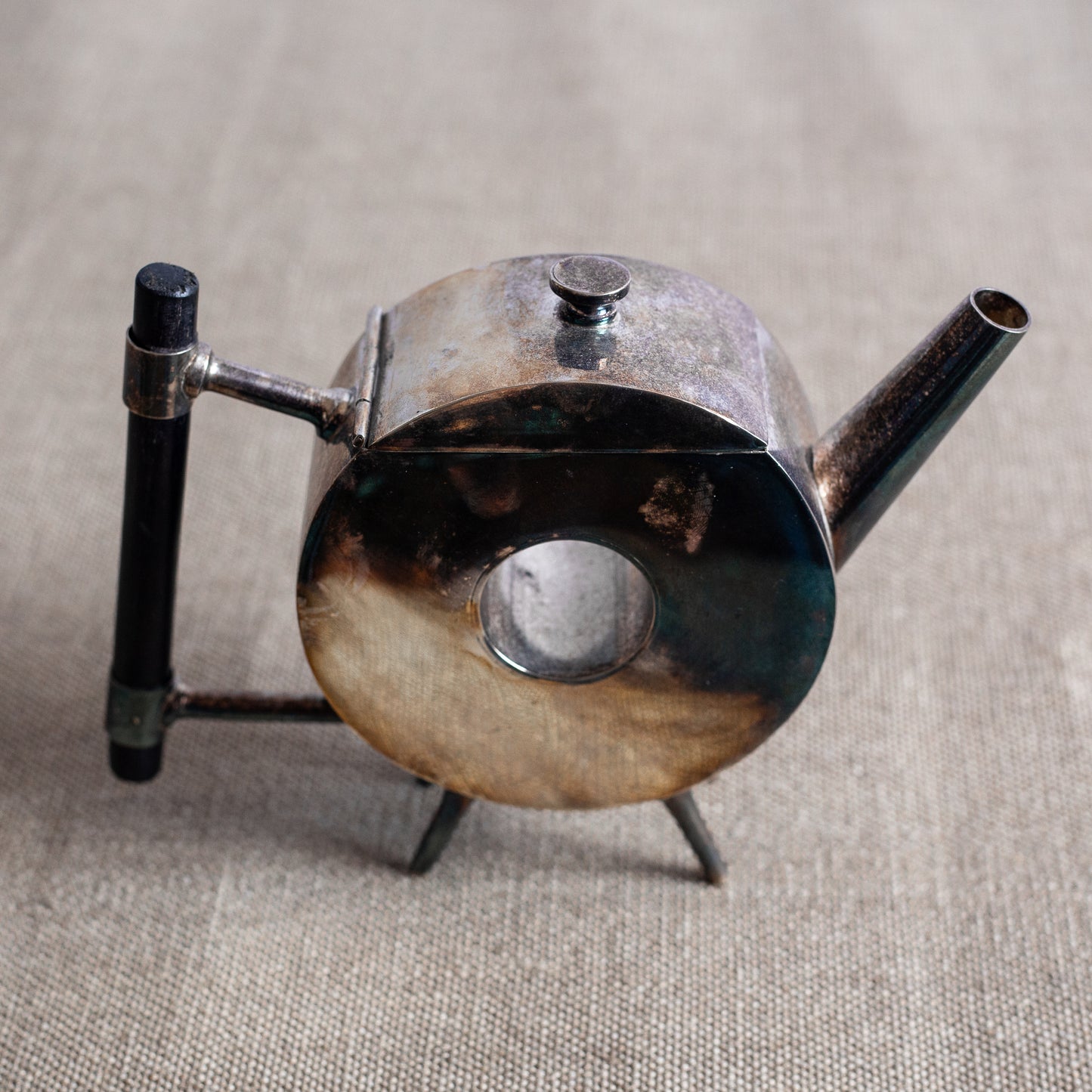 Silverplated Donut Teapot, Christopher Dresser, England. C20th.