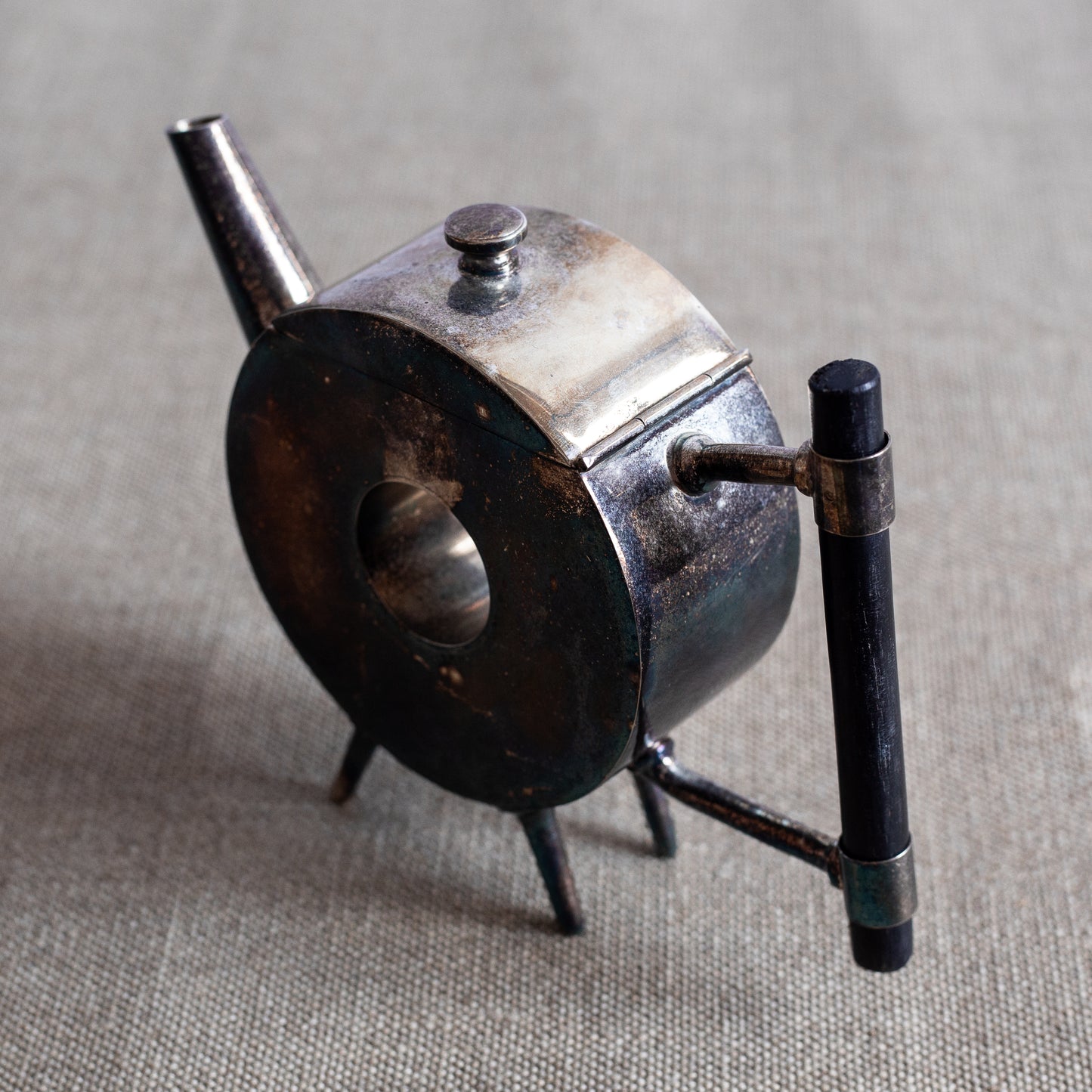 Silverplated Donut Teapot, Christopher Dresser, England. C20th.