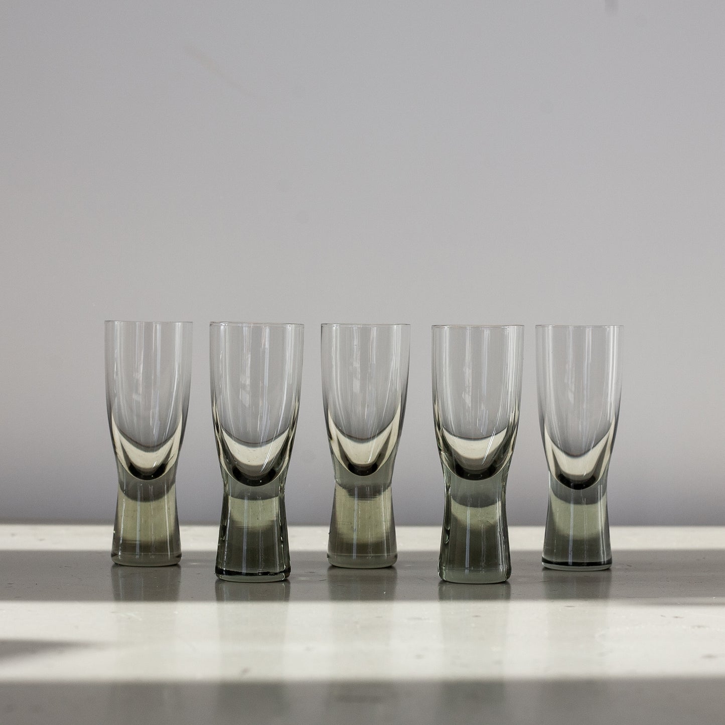 Set of 5 ‘Canada Smoke’ schnapps glasses and ‘Donut’ decanter, Per Lutken, Holmegaard, Denmark. 1950’s.