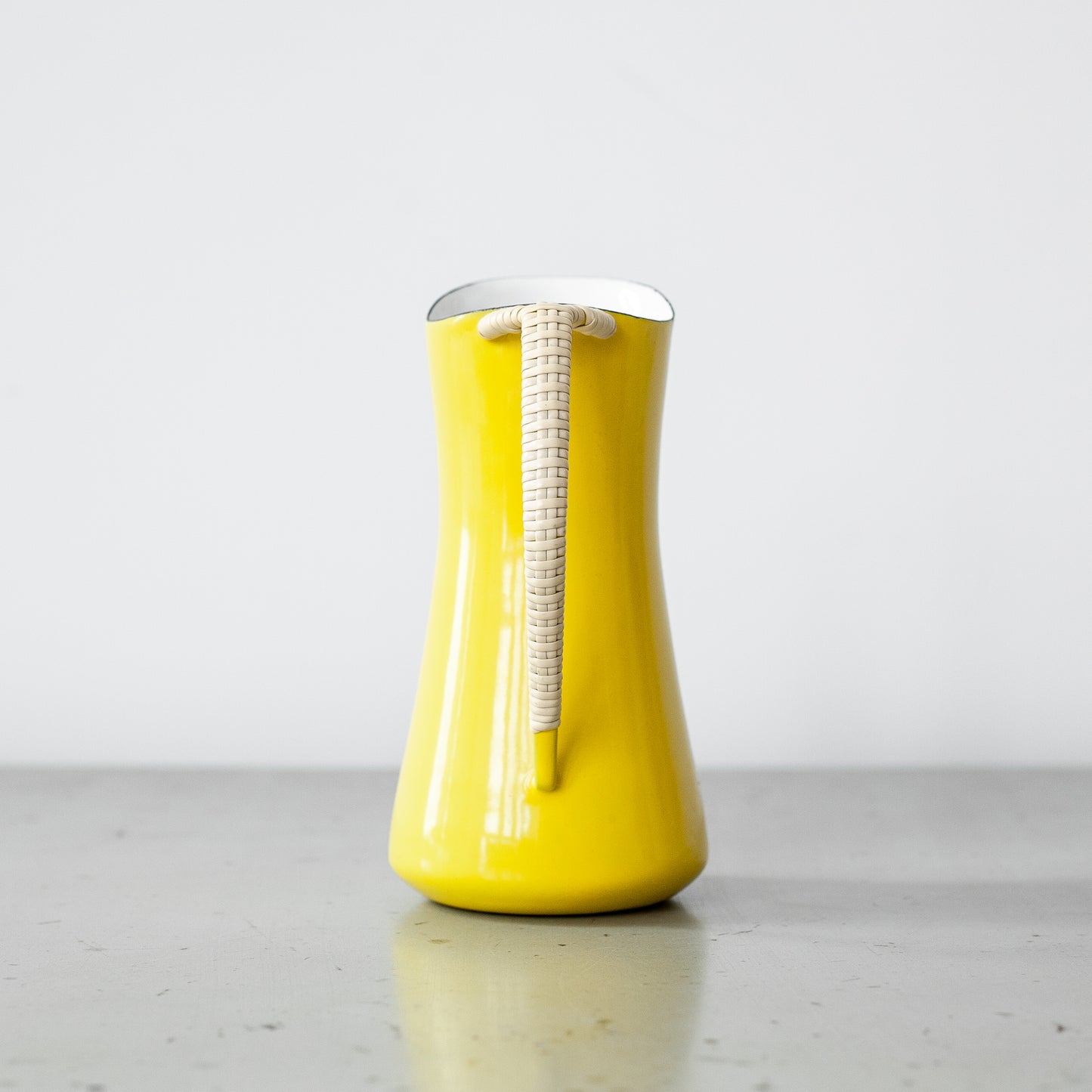 Yellow Købenstyle pitcher, Jens Quistgaard, Dansk Designs, Denmark. 1960’s.