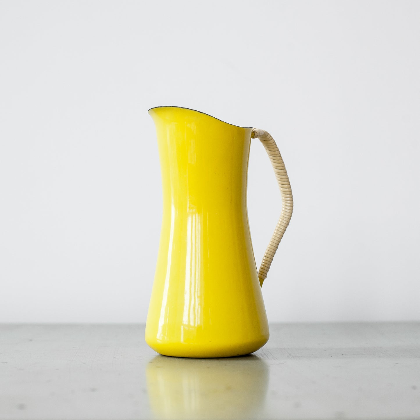 Yellow Købenstyle pitcher, Jens Quistgaard, Dansk Designs, Denmark. 1960’s.