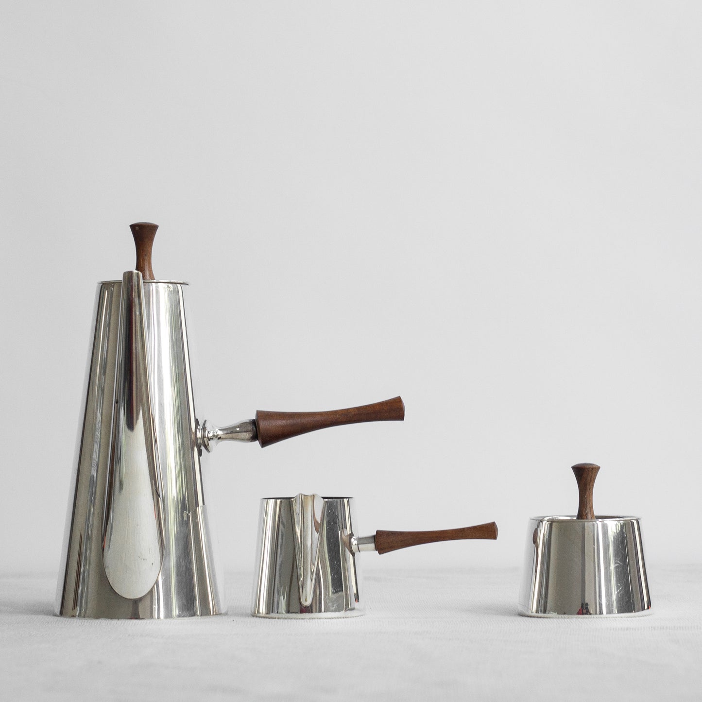 Modernist silver-plate and rosewood coffee set, Italy, 1950s.