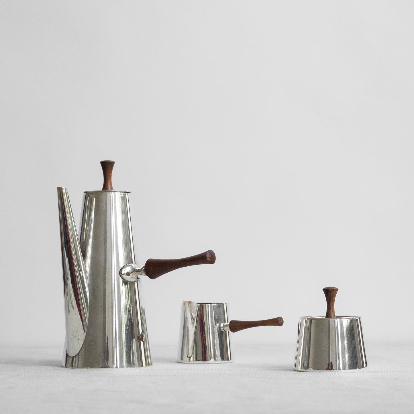 Modernist silver-plate and rosewood coffee set, Italy, 1950s.