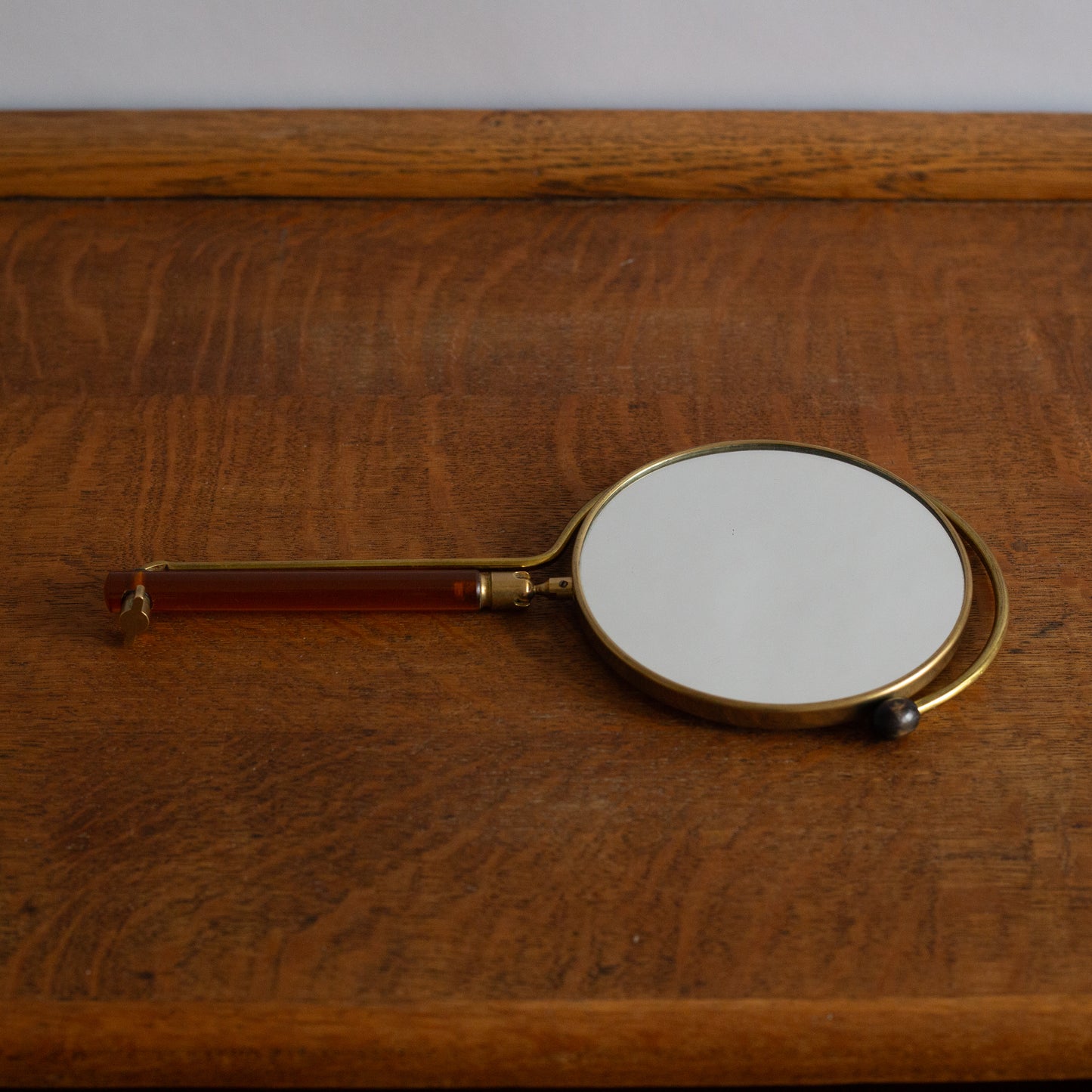 Adjustable Lucite and Brass table/hand mirror, France. 1950’s.