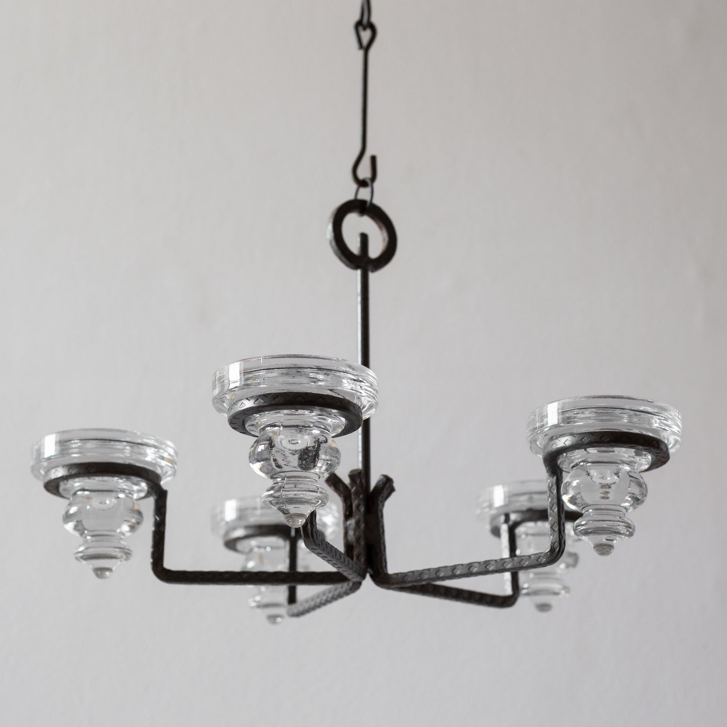Iron and Glass Chandelier in the manner of Bertil Vallien, Sweden. 1960’s.