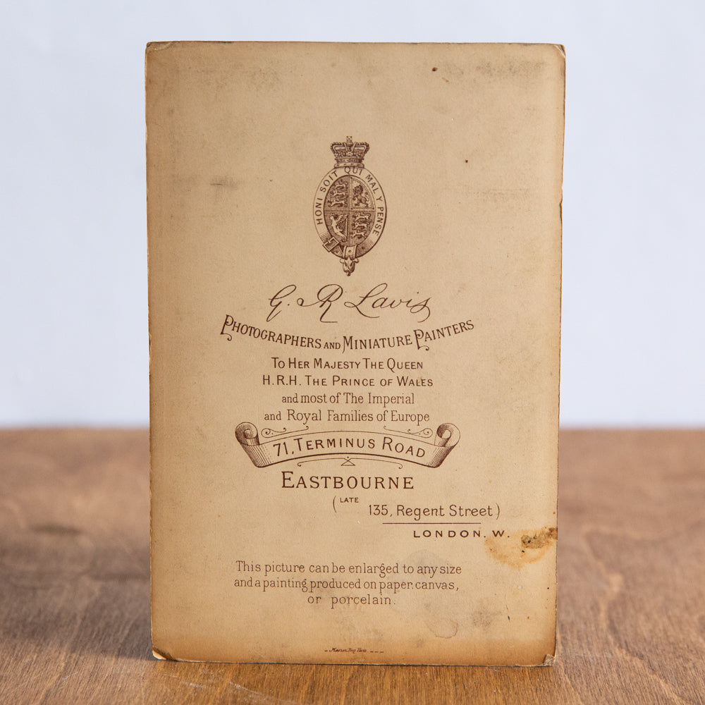 Framed Cabinet Photograph of a Girl with a Dog, G & R Lavis, England. Circa 1890.