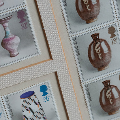 Framed Collection of Royal Mail Pottery Stamps designed by Tony Evans, England. 1987.