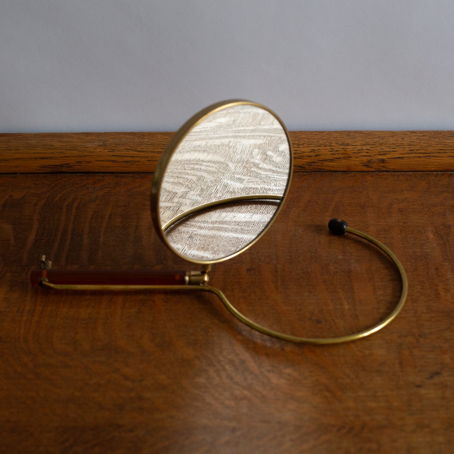 Adjustable Lucite and Brass table/hand mirror, France. 1950’s.