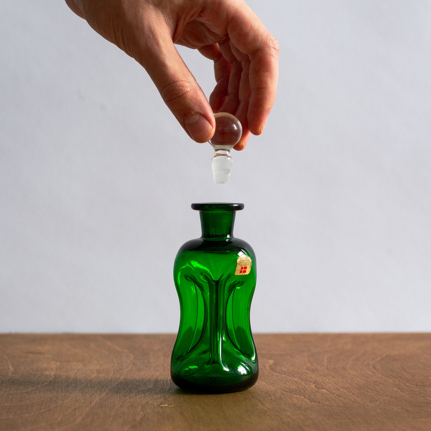 Rare Miniature Green ‘Kluk Kluk’ decanter, Jacob Bang, Holmegaard, Denmark. 1950s.