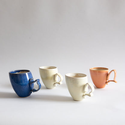 'Tango' Stoneware Mug in Cream, Jaroslav Hrustalenko, England. 2000s.