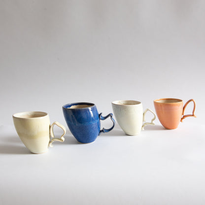 'Tango' Stoneware Mug in Cream, Jaroslav Hrustalenko, England. 2000s.