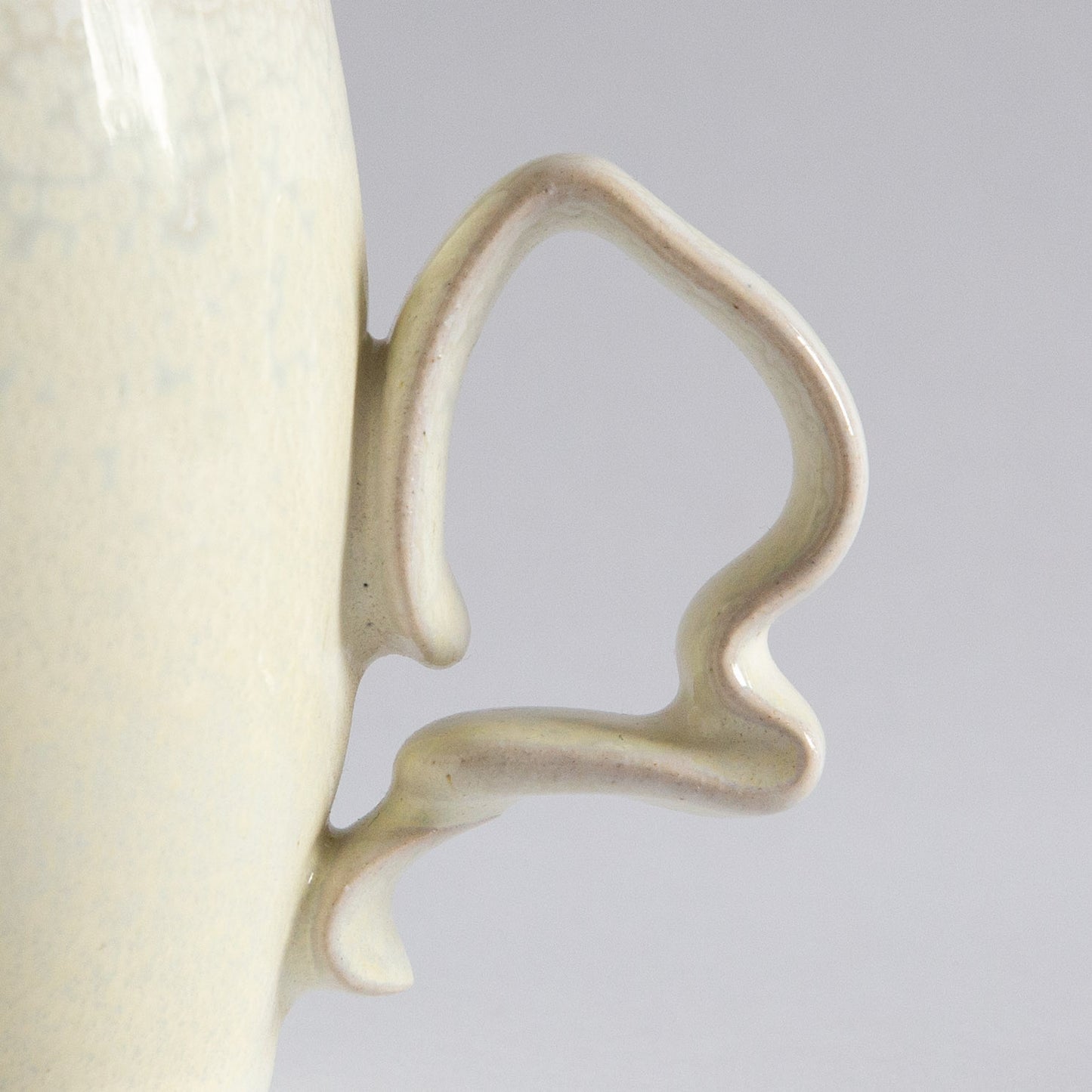 'Tango' Stoneware Mug in Cream, Jaroslav Hrustalenko, England. 2000s.