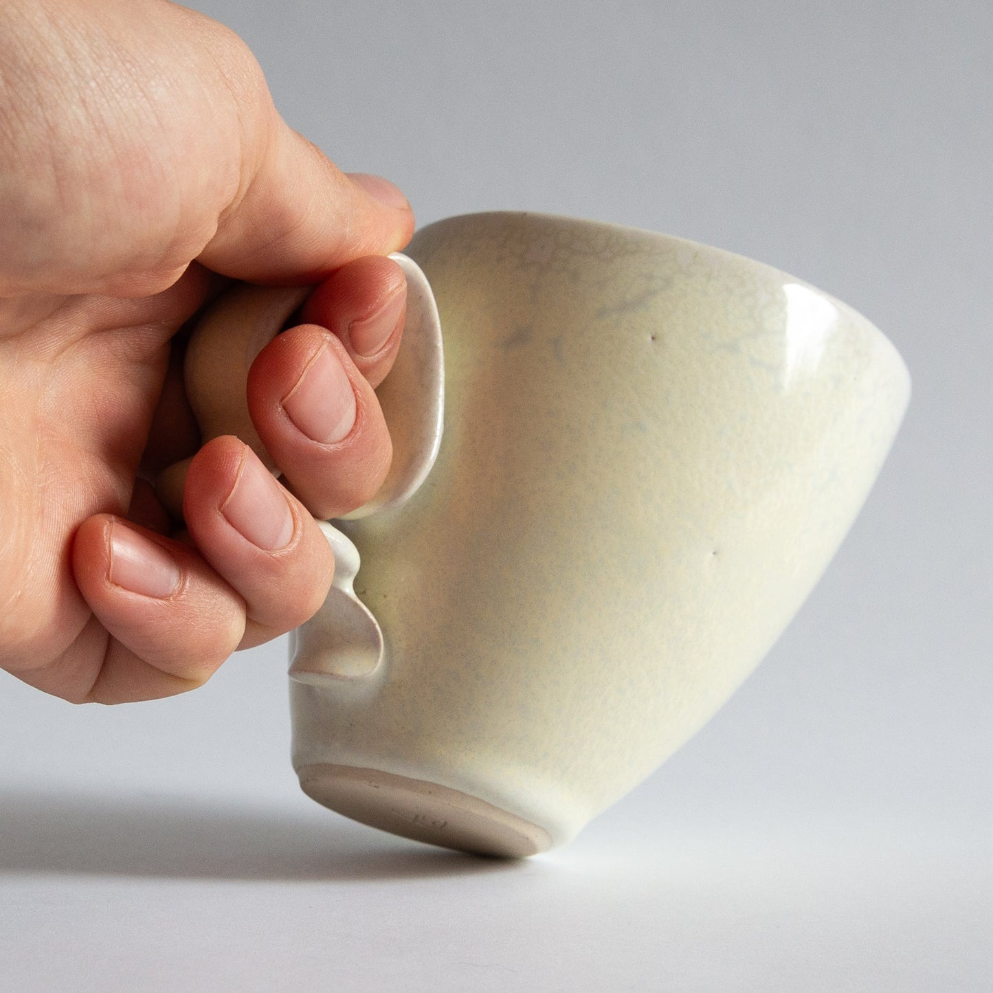 'Tango' Stoneware Mug in Cream, Jaroslav Hrustalenko, England. 2000s.