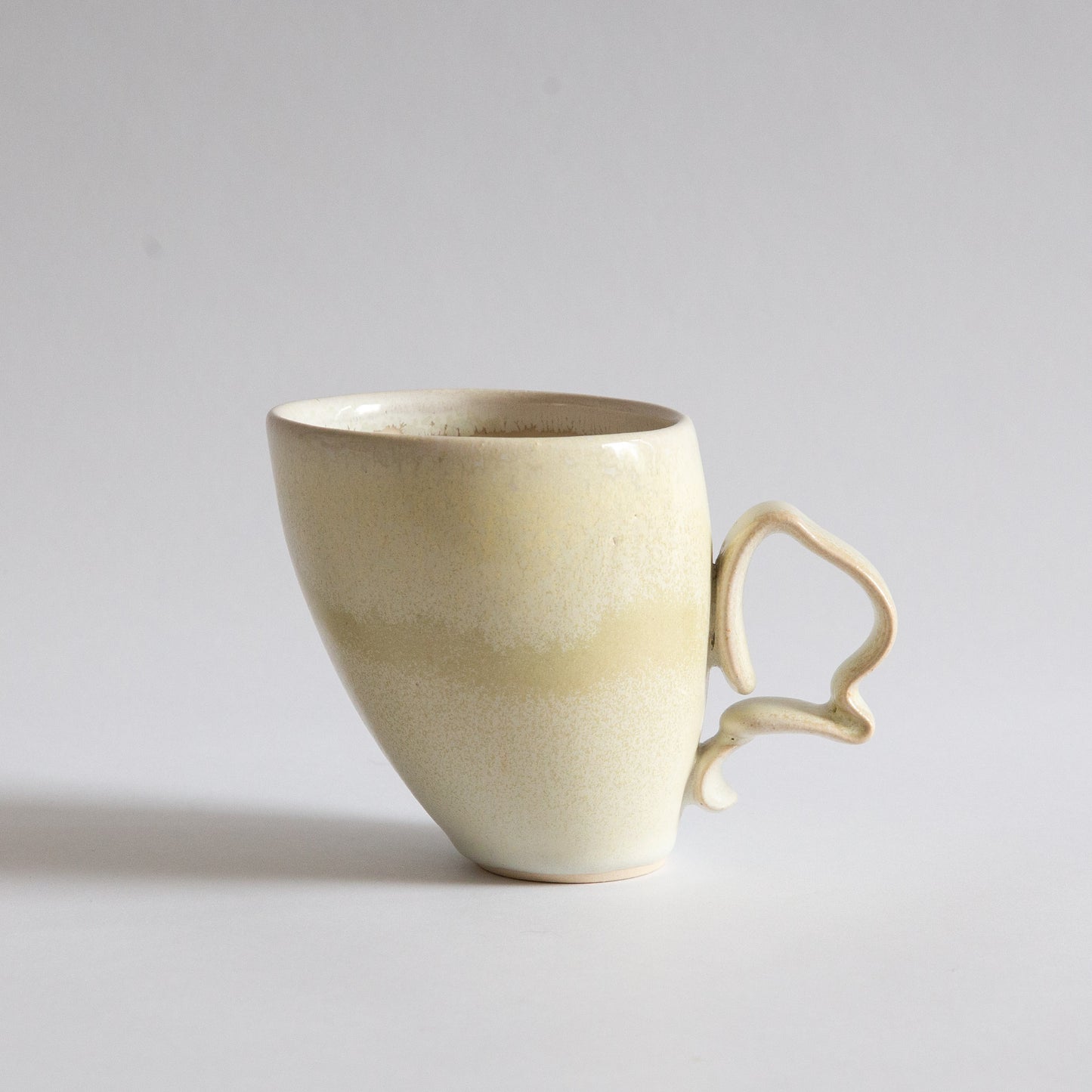 'Tango' Stoneware Mug in Off-White, Jaroslav Hrustalenko, England. 2000s.
