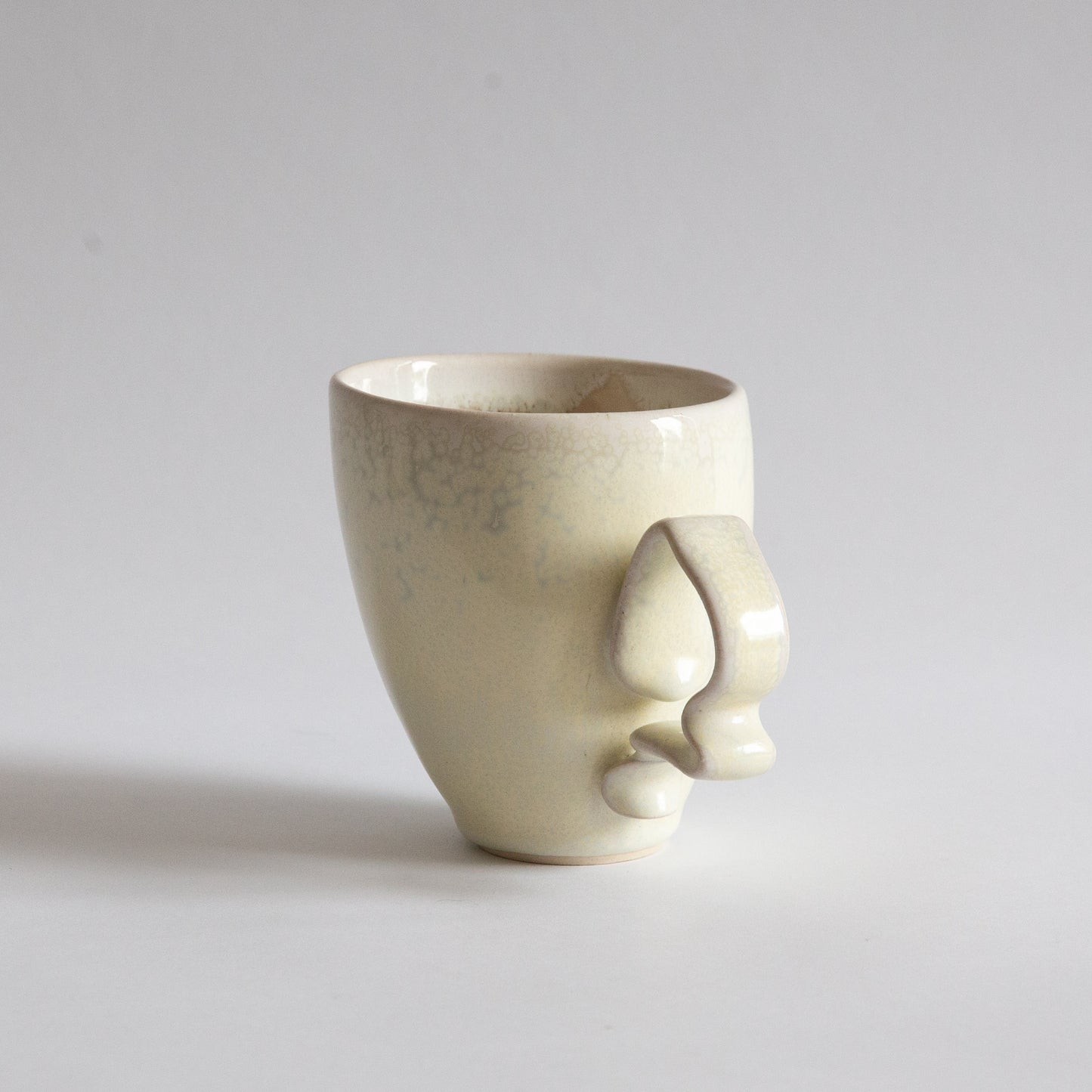 'Tango' Stoneware Mug in Cream, Jaroslav Hrustalenko, England. 2000s.