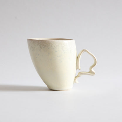 'Tango' Stoneware Mug in Cream, Jaroslav Hrustalenko, England. 2000s.