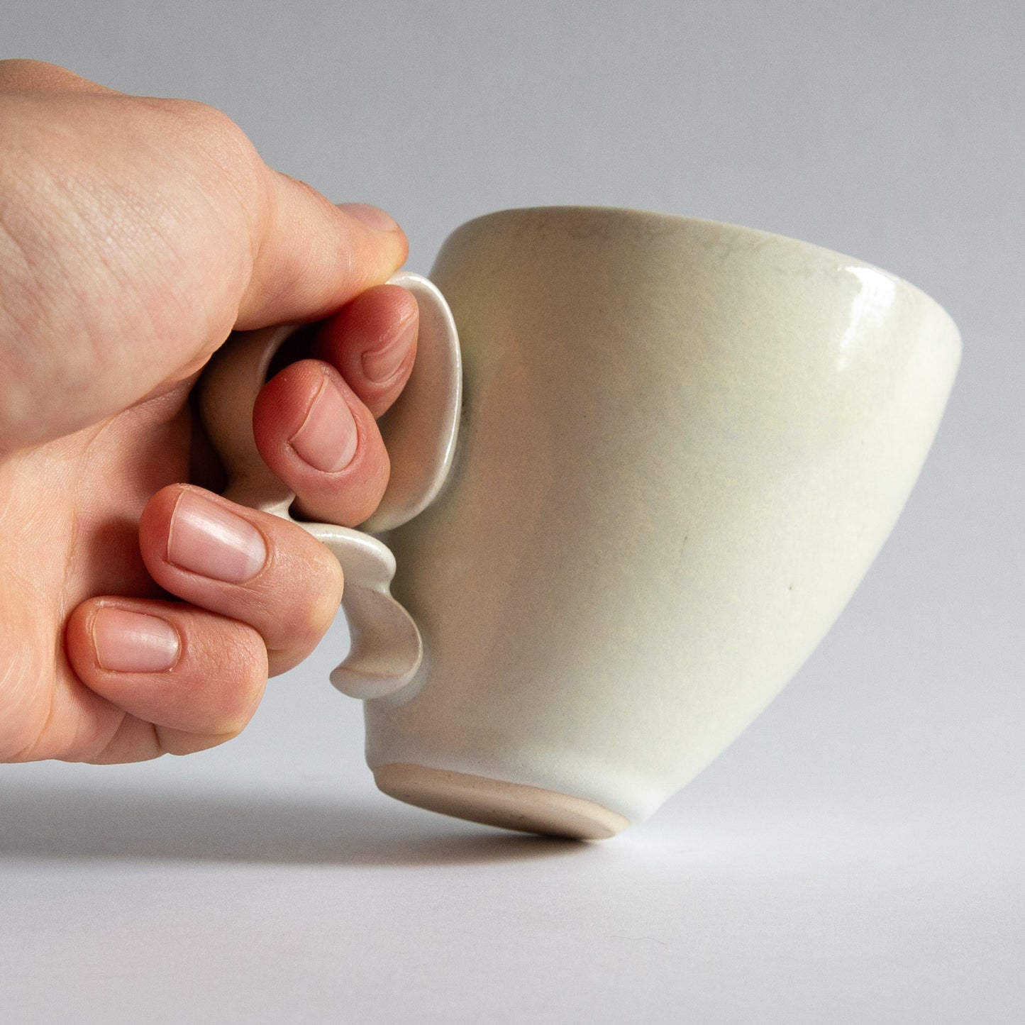 'Tango' Stoneware Mug in Off-White, Jaroslav Hrustalenko, England. 2000s.