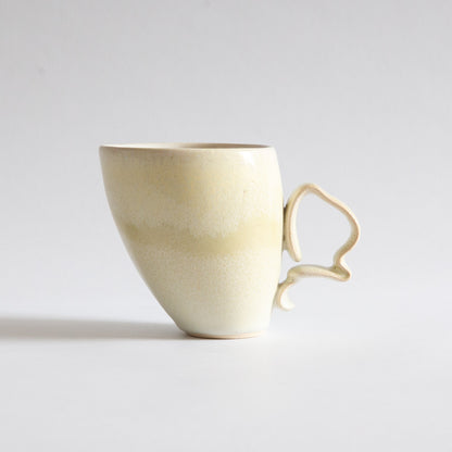 'Tango' Stoneware Mug in Off-White, Jaroslav Hrustalenko, England. 2000s.