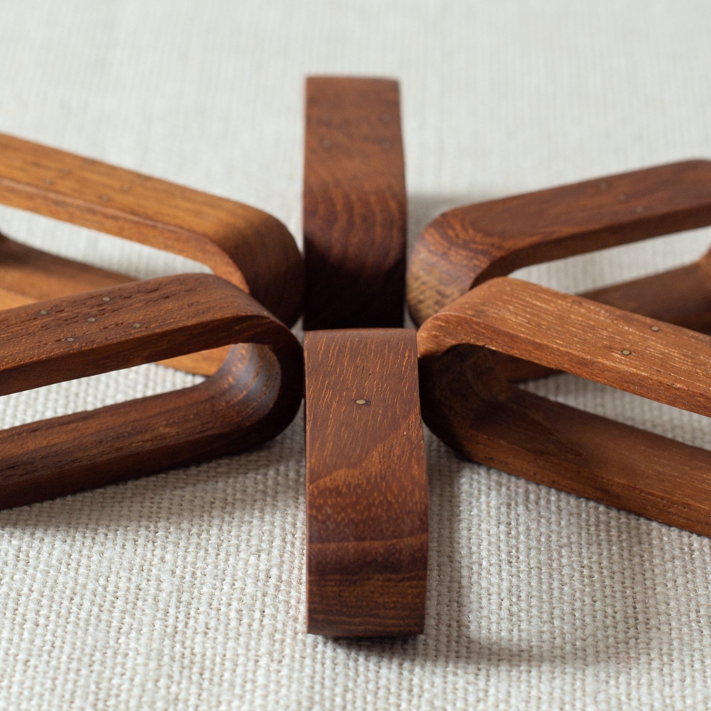 Set of six teak and brass napkin rings, Laurids Lønborg, Denmark. 1950s.