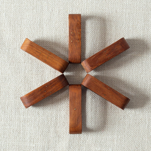 Set of six teak and brass napkin rings, Laurids Lønborg, Denmark. 1950s.