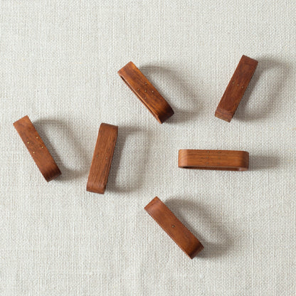 Set of six teak and brass napkin rings, Laurids Lønborg, Denmark. 1950s.