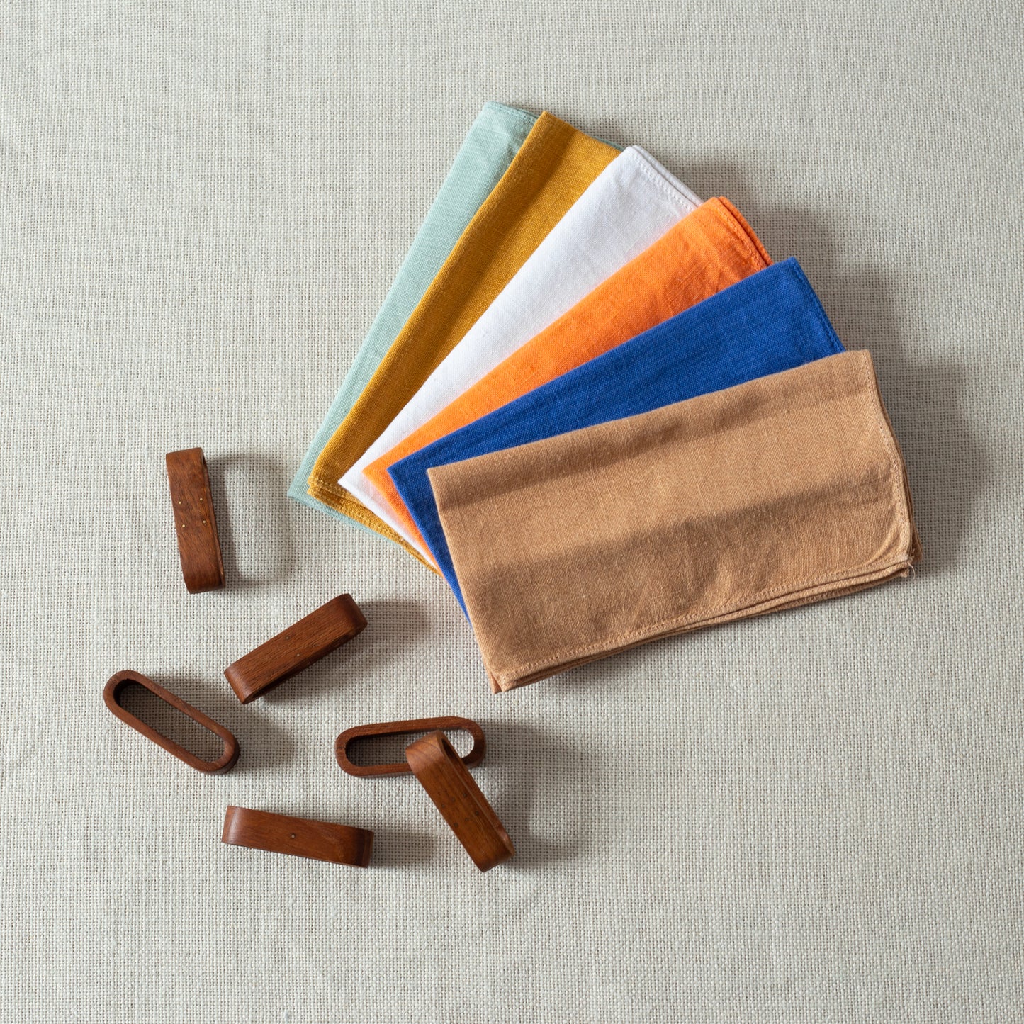 Set of six teak and brass napkin rings, Laurids Lønborg, Denmark. 1950s.