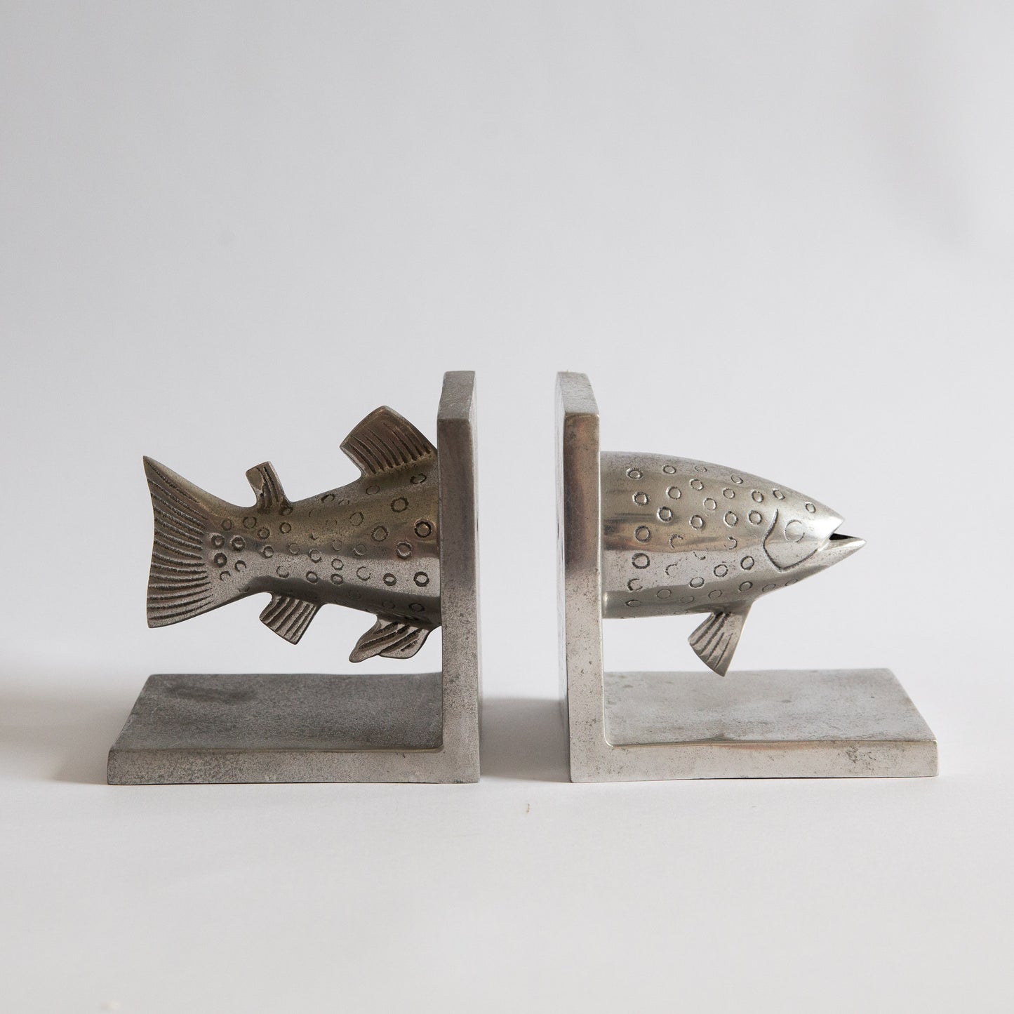 Pair of Postmodern Cast Aluminium Fish Bookends. Early 2000s.