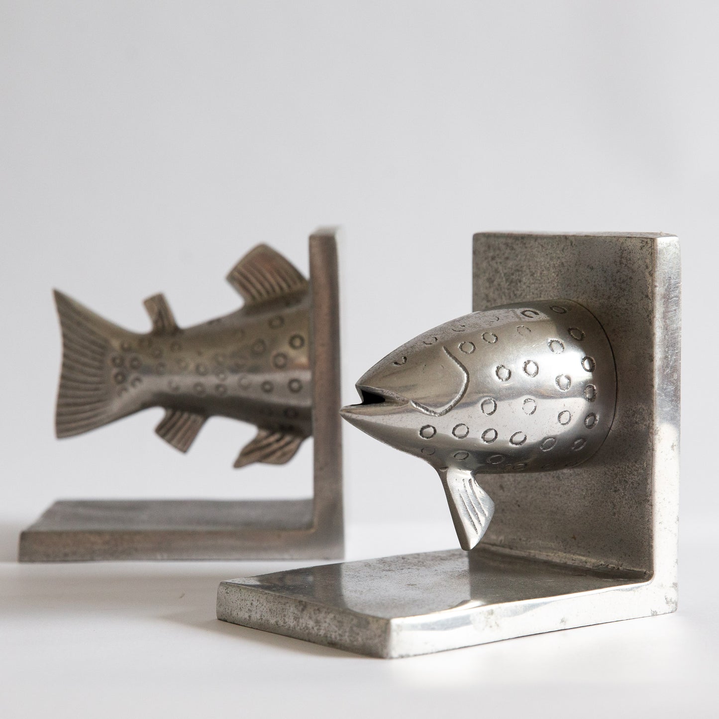 Pair of Postmodern Cast Aluminium Fish Bookends. Early 2000s.