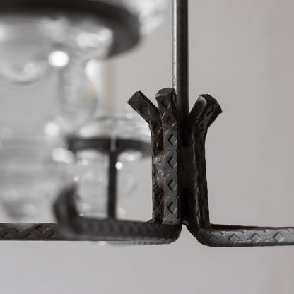 Iron and Glass Chandelier in the manner of Bertil Vallien, Sweden. 1960’s.